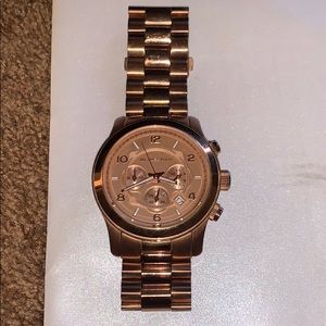 MK rose gold large faced watch